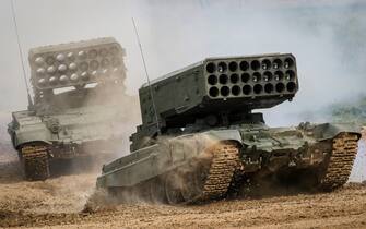 MOSCOW, RUSSIA - 2021/08/25: Russian Army  TOS-1A "Solntsepyok (Blazing Sun)" multiple rocket launcher and thermobaric weapon mounted on a T-72 tank chassis seen during the annual Army Games defense technology international exhibition.
The International Army Games is an annual Russian military sports event organized by the Ministry of Defense of Russia. The event, which was first staged in August 2015, involves close to 30 countries taking part in dozens of competitions over two weeks to prove which is the most skilled. Dynamic demonstration is a part of the Army Games public display. (Photo by Leonid Faerberg/SOPA Images/LightRocket via Getty Images)