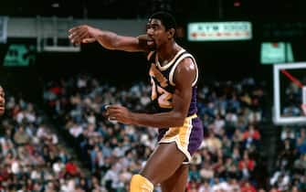 1983: Magic Johnson #32 of the Los Angeles Lakers makes a pass during an NBA game.  NOTE TO USER: User expressly acknowledges and agrees that, by downloading and/or using this Photograph, user is consenting to the terms and conditions of the Getty Images License Agreement.  Mandatory Copyright Notice: Copyright 1983 NBAE (Photo by Jim Wachter/NBAE via Getty Images)