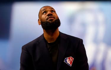 CLEVELAND, OHIO - FEBRUARY 20: LeBron James reacts after being introduced as part of the NBA 75th Anniversary Team during the 2022 NBA All-Star Game at Rocket Mortgage Fieldhouse on February 20, 2022 in Cleveland, Ohio. NOTE TO USER: User expressly acknowledges and agrees that, by downloading and or using this photograph, User is consenting to the terms and conditions of the Getty Images License Agreement. (Photo by Tim Nwachukwu/Getty Images)