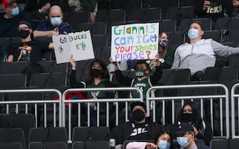 MILWAUKEE, WI - MARCH 24: Milwaukee Bucks fans attends a game between the Boston Celtics and Milwaukee Bucks on March 24, 2021 at the Fiserv Forum Center in Milwaukee, Wisconsin. NOTE TO USER: User expressly acknowledges and agrees that, by downloading and or using this Photograph, user is consenting to the terms and conditions of the Getty Images License Agreement. Mandatory Copyright Notice: Copyright 2021 NBAE (Photo by Gary Dineen/NBAE via Getty Images).