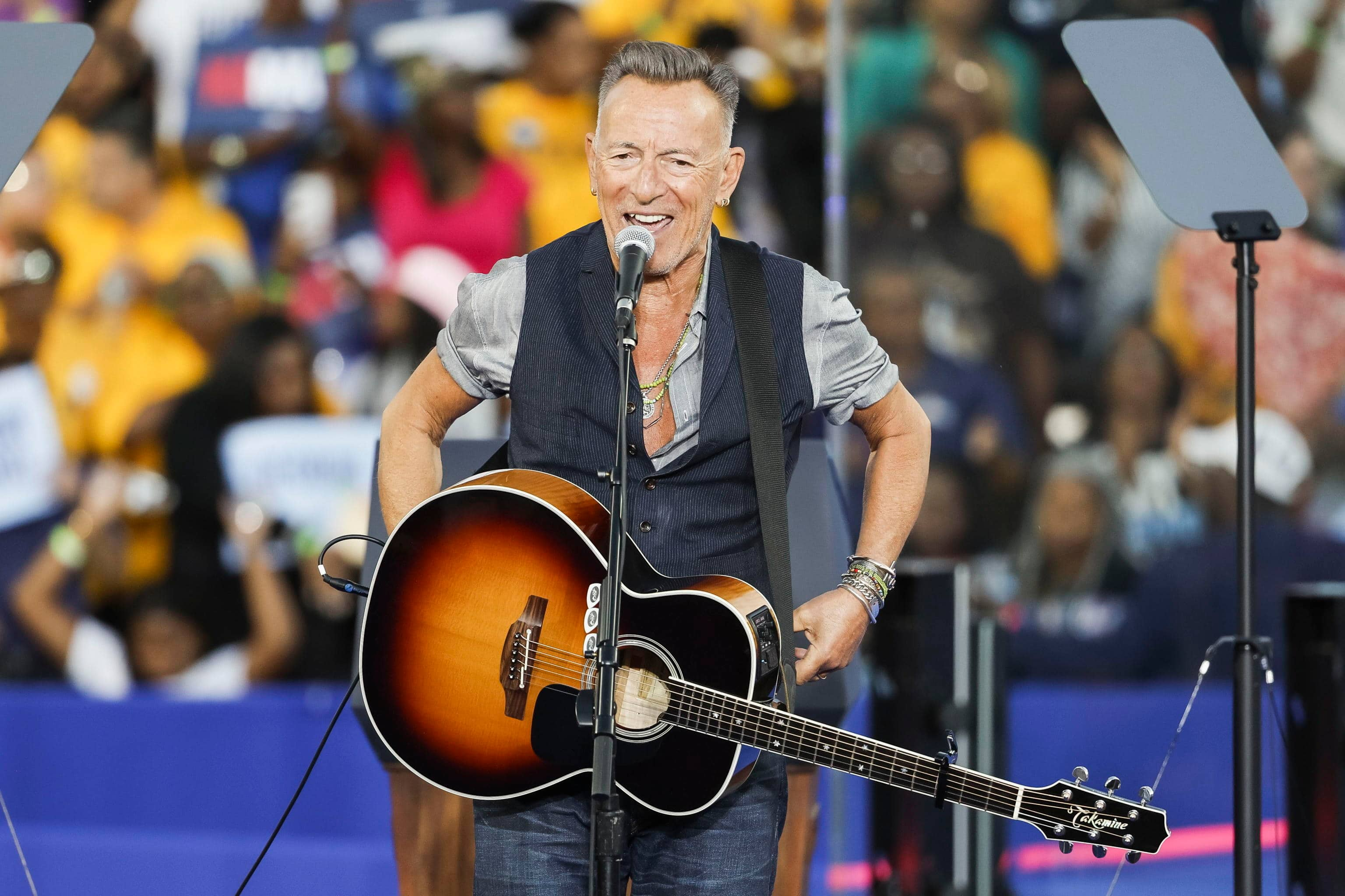 epa11681851 Musician Bruce Springsteen performs during a campaign rally for Democratic presidential candidate US Vice President Kamala Harris at the James R. Hallford Stadium in Clarkston, Georgia, USA, 24 October 2024. Harris is running against former US president and Republican presidential nominee Donald Trump and the United States will hold its election on 05 November 2024.  EPA/ERIK S. LESSER