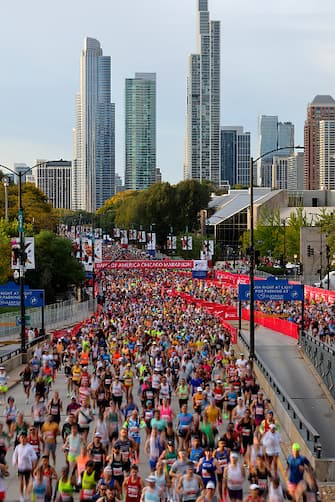 CHICAGO, ILLINOIS - OCTOBER 08: Runners compete in the 2023 Chicago Marathon at Grant Park on October 08, 2023 in Chicago, Illinois. (Photo by Michael Reaves/Getty Images)