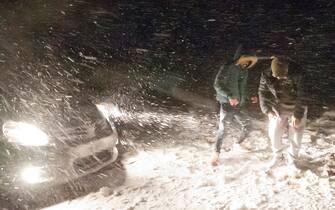 Mandatory Credit: Photo by Graham M Lawrence/LNP/Shutterstock (15073740a)
Young people from Cardiff get out of their car at Storey Arms to challenge the blizzard which hit the Brecon Beacons National Park in Powys.
Blizzard Hits Wales, UK, Brecon, Powys, Wales, United Kingdom. - 04 Jan 2025