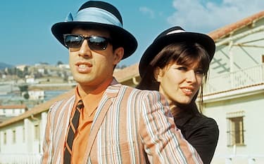 Italian singer Adriano Celentano and his wife Claudia Mori posing together in the street at the 18th Sanremo Music Festival. Sanremo, February 1968 (Photo by Mondadori via Getty Images)