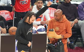 CLEVELAND, OH - FEBRUARY 19: Cole Anthony #50 of the Orlando Magic receives a pair of Timberlands from his father, Greg Anthony during the AT&T Slam Dunk as part of 2022 NBA All Star Weekend on February 19, 2022 at Rocket Mortgage FieldHouse in Cleveland, Ohio. NOTE TO USER: User expressly acknowledges and agrees that, by downloading and/or using this Photograph, user is consenting to the terms and conditions of the Getty Images License Agreement. Mandatory Copyright Notice: Copyright 2022 NBAE (Photo by Jeff Haynes/NBAE via Getty Images)