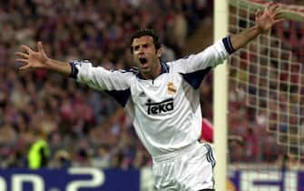 MUN13 - 20010509 - MUNICH, GERMANY : Portuguese international Luis Figo of Real Madrid celebrates after scoring the 1-1 equalizer against Bayern Munich in the UEFA Champions League, semi final second leg match at olympic stadium in Munich on Wednesday, 09 May 2001. 
EPA PHOTO DPA/FRANK LEONHARDT