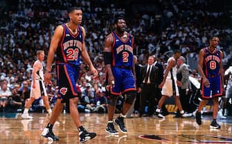 SAN ANTONIO - JUNE 16:  Allan Houston #20 and Larry Johnson #2 of the New York Knicks walk off the court  during Game One of the 1999 NBA Finals played on June 16, 1999 at the Alamodome in San Antonio, Texas.  NOTE TO USER: User expressly acknowledges that, by downloading and or using this photograph, User is consenting to the terms and conditions of the Getty Images License agreement. Mandatory Copyright Notice: Copyright 1999 NBAE (Photo by Nathaniel S. Butler/NBAE via Getty Images)