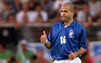 SMM10-19980617-MONTPELLIER: Italian Luigi Di Biagio celebrates after scoring the first goal 17 June at the Stade de la Mosson in Montpellier during the 1998 Soccer World Cup Group B first round match between Italy and Cameroon. (ELECTRONIC IMAGE)
EPA PHOTO/AFP/BORIS HORVAT