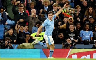 epa10870428 Julian Alvarez of Manchester City celebrates after scoring the 1-1 during the UEFA Champions League Group G match between Manchester City and Red Star Belgrade in Manchester, Britain, 19 September 2023.  EPA/ADAM VAUGHAN