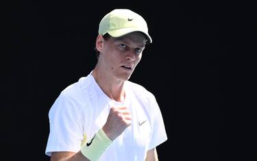 epa11821486 Jannik Sinner of Italy reacts while in action against Nicolas Jarry of Chile during their first round match during the 2025 Australian Open tennis tournament at Melbourne Park in Melbourne, Australia, 13 January 2025.  EPA/JOEL CARRETT  AUSTRALIA AND NEW ZEALAND OUT