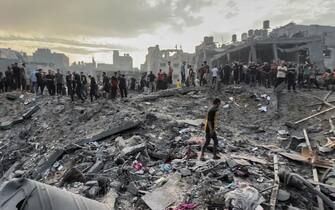 31 October 2023, Palestinian Territories, Jabalia: A screen grab from a video shows Palestinians searching for survivors following an Israeli airstrike in the Jabalia refugee camp north of Gaza City. (Best Quality Available) Photo: Fadi Wael Alwhidi/dpa (Photo by Fadi Wael Alwhidi/picture alliance via Getty Images)