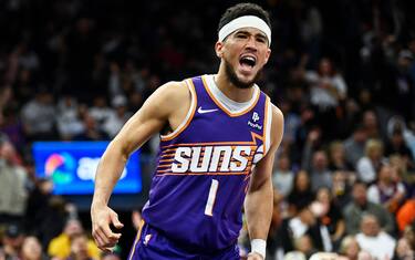 PHOENIX, ARIZONA - DECEMBER 08: Devin Booker #1 of the Phoenix Suns reacts to a call during the second half of the NBA game against the Sacramento Kings at Footprint Center on December 08, 2023 in Phoenix, Arizona. The Kings defeated the Suns 114-106. NOTE TO USER: User expressly acknowledges and agrees that, by downloading and or using this photograph, User is consenting to the terms and conditions of the Getty Images License Agreement. (Photo by Kelsey Grant/Getty Images)