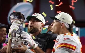 epa10464409 Kansas City Chiefs Travis Kelce (L) and Patrick Mahomes (R) celebrate with the Vince Lombardi Trophy after defeating the Philadelphia Eagles in Super Bowl LVII between the AFC champion Kansas City Chiefs and the NFC champion Philadelphia Eagles at State Farm Stadium in Glendale, Arizona, 12 February 2023. The annual Super Bowl is the Championship game of the NFL between the AFC Champion and the NFC Champion and has been held every year since January of 1967.  EPA/CAROLINE BREHMAN