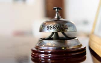 Service bell on the reception desk of a hotel.