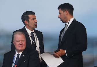 BERLIN, GERMANY - JULY 14: Luis Figo, former Portuguese footballers speaks with Sami Khedira, former German footballer prior to the UEFA EURO 2024 final match between Spain and England at Olympiastadion on July 14, 2024 in Berlin, Germany. (Photo by Lars Baron/Getty Images)