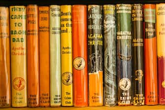 England, Devon, Galmpton, Agatha Christie's Holiday Home Greenway, The Library, Display of Agatha Christie Novels (Photo by: Dukas/Universal Images Group via Getty Images)