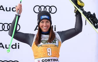 Third placed Elena Curtoni of Italy celebrates on the podium after the Women's Downhill race at the FIS Alpine Skiing World Cup in Cortina d'Ampezzo, Italy, 21 January 2023. ANSA/SERGIO BISI