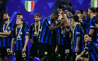 Inter Milan's French forward #09 Marcus Thuram (C) celebrates with teammates during a ceremony for the Italian Champions following the Italian Serie A football match between Inter Milan and Lazio in Milan, on May 19, 2024. Inter celebrates his 20th Scudetto. (Photo by Marco BERTORELLO / AFP) (Photo by MARCO BERTORELLO/AFP via Getty Images)