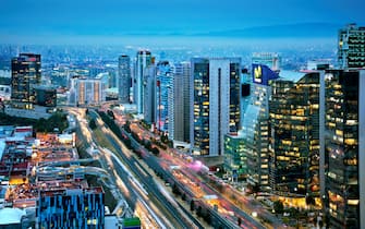 The high rise office buildings and condominiums in the business district of Santa Fe located in the western part of Mexico City.