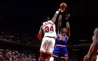 HOUSTON - JUNE 22:  Patrick Ewing #33of the New York Knicks shoots against Hakeem Olajuwon #34 of the Houston Rockets during Game Seven of the 1994 NBA Finals at the Summit on June 22, 1994 in Houston, Texas.  NOTE TO USER: User expressly acknowledges that, by downloading and or using this photograph, User is consenting to the terms and conditions of the Getty Images License agreement. Mandatory Copyright Notice: Copyright 1994 NBAE (Photo by Andrew D. Bernstein/NBAE via Getty Images)