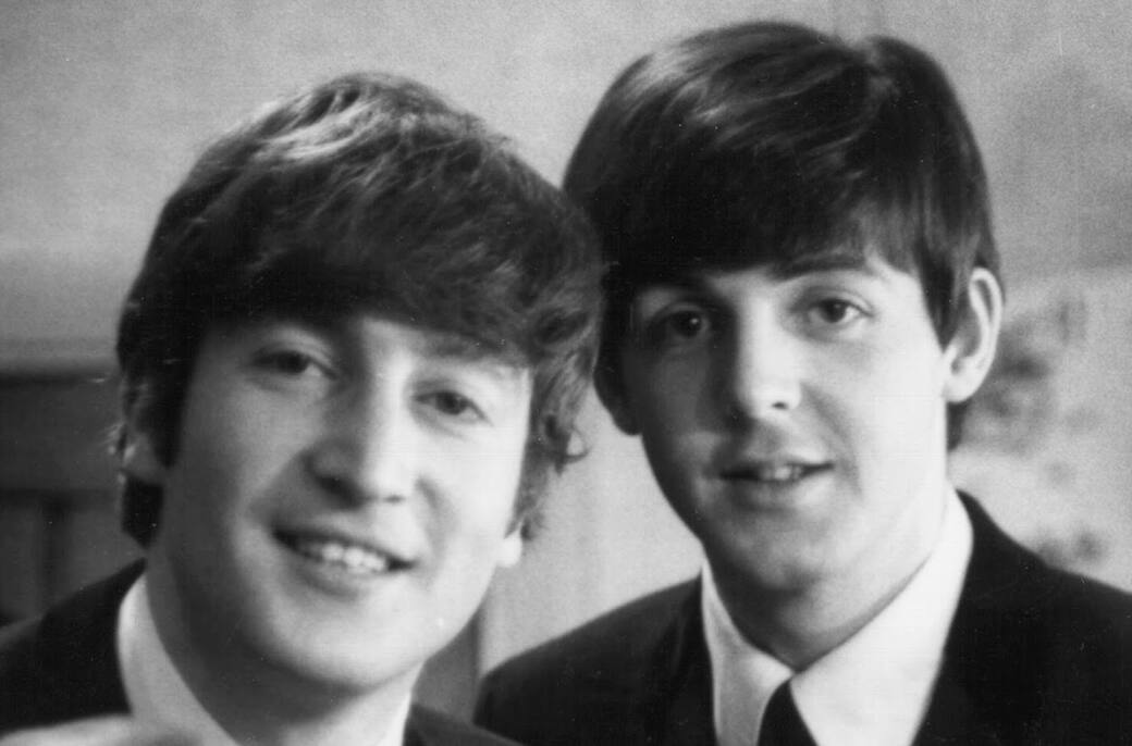 Paul McCartney and John Lennon backstage at Finsbury Park. London, UK © Getty Images