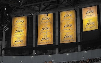 LOS ANGELES - OCTOBER 26:  The 2009-2010 Los Angeles Lakers Championship banner is displayed during the ring ceremony prior to the opening night game against the Houston Rockets at Staples Center on October 26, 2010 in Los Angeles, California. NOTE TO USER: User expressly acknowledges and agrees that, by downloading and/or using this Photograph, user is consenting to the terms and conditions of the Getty Images License Agreement. Mandatory Copyright Notice: Copyright 2010 NBAE (Photo by Noah Graham/NBAE via Getty Images)