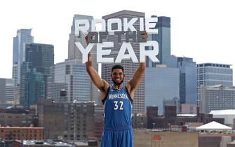 MINNEAPOLIS, MN - MAY 13:  Karl-Anthony Towns #32 of the Minnesota Timberwolves poses with the Eddie Gottlieb trophy in preparation for his being named the 2015- 2016 Kia NBA Rookie of the Year on May 13, 2016 in Minneapolis, Minnesota.  NOTE TO USER: User expressly acknowledges and agrees that, by downloading and or using this Photograph, user is consenting to the terms and conditions of the Getty Images License Agreement. Mandatory Copyright Notice: Copyright 2016 NBAE (Photo by David Sherman/NBAE via Getty Images)