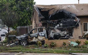San Diego A home is partially destroyed where a small plane crashed into a San Diego, California, residential street on May 22, 2025. The Federal Aviation Authority said a Cessna 550 crashed at around 3:45 am local time. The neighborhood is close to the Montgomery-Gibbs Executive Airport. The crash left a "gigantic debris field" and damaged some 15 homes and parked cars, ABC News quoted the San Diego assistant fire chief as saying. (Photo by Sandy Huffaker / AFP)