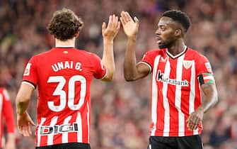 epa11197282 Athletic's Inaki Williams (R) and Unai Gomez (L) gesture during the Spanish LaLiga soccer match between Athletic Club de Bilbao and FC Barcelona, in Bilbao, Basque Country, Spain, 03 March 2024.  EPA/Luis Tejido