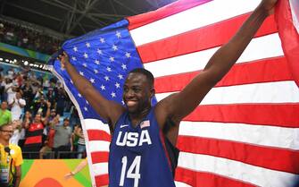RIO DE JANEIRO, BRAZIL - AUGUST 21:  Draymond Green #14 of the USA Basketball Men's National Team celebrates after winning the Gold Medal Game against Serbia on Day 16 of the Rio 2016 Olympic Games at Carioca Arena 1 on August 21, 2016 in Rio de Janeiro, Brazil. NOTE TO USER: User expressly acknowledges and agrees that, by downloading and/or using this Photograph, user is consenting to the terms and conditions of the Getty Images License Agreement. Mandatory Copyright Notice: Copyright 2016 NBAE (Photo by Jesse D. Garrabrant/NBAE via Getty Images) 