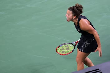 NEW YORK, NEW YORK - AUGUST 24: Jasmine Paolini of Italy celebrates match point against Destanee Aiava of Australia during their Women's Singles First Round match on Day One of the 2025 US Open at USTA Billie Jean King National Tennis Center on August 24, 2025 in the Flushing neighborhood of the Queens borough of New York City. (Photo by Elsa/Getty Images)