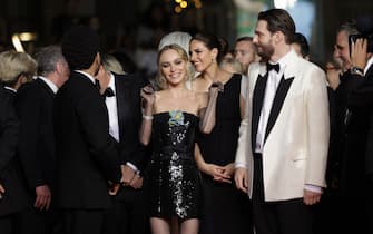 CANNES, FRANCE - MAY 22: (L-R) Abel “The Weeknd” Tesfaye, Lily-Rose Depp and Sam Levinson attend the "The Idol" red carpet during the 76th annual Cannes film festival at Palais des Festivals on May 22, 2023 in Cannes, France. (Photo by Pascal Le Segretain/Getty Images)