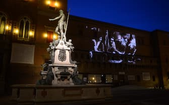 BOLOGNA, ITALY - APRIL 25: The movie "The Forgotten Front" is projected on to the D'Accursio Palace to celebrate the 70th Anniversary of the Liberation from fascism and nazism during World War II at Neptune Square on April 25, 2020 in Bologna, Italy. Italy is still in lockdown for the COVID-19 spread.  (Photo by Roberto Serra - Iguana Press/Getty Images)