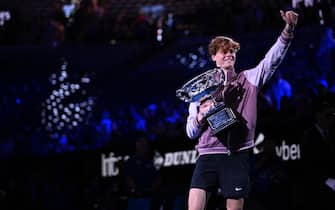 epa11110616 Jannik Sinner of Italy with the Norman Brookes Challenge Cup following his win in the Menâ  s Singles final against Daniil Medvedev of Russia on Day 15 of the Australian Open tennis tournament in Melbourne, Australia, 28 January 2024.  EPA/JOEL CARRETT AUSTRALIA AND NEW ZEALAND OUT