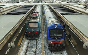 Modern high-speed passenger trains stand on the Roma Termini railways station platform Italy. (Photo by: Education Images/Universal Images Group via Getty Images)