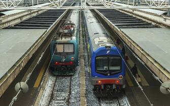 Modern high-speed passenger trains stand on the Roma Termini railways station platform Italy. (Photo by: Education Images/Universal Images Group via Getty Images)