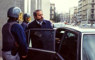 The Italian judge Giovanni Falcone was escorted by police out of the Court of Palermo, Italy, on May 16, 1985. Giovanni Falcone was killed by the Mafia in 1992.  ( Photo by Vittoriano Rastelli )
