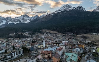 Andalo Aerial drone view of Andalo town with mountains background in winter. Ski resort Paganella Andalo, Trentino-Alto Adige, Italy., Italian Dolomites,.Pagnella valley. Snow covered Italian Dolomites at winter.
