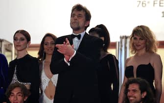Italian director Nanni Moretti (C) arrives with cast members for the screening of the film "Il Sol Dell'Avvenire" (A Brighter Tomorrow) during the 76th edition of the Cannes Film Festival in Cannes, southern France, on May 24, 2023. (Photo by Valery HACHE / AFP) (Photo by VALERY HACHE/AFP via Getty Images)