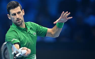Novak Djokovic of serbia in action against Casper Ruud of Norway during the Nitto ATP Finals 2022 tennis tournament at the Pala Alpitour arena in Turin, Italy, 20 November 2022.ANSA/ALESSANDRO DI MARCO