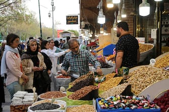TEHRAN, IRAN - APRIL 07: People shop at Grand Bazaar for the upcoming Eid Al-Fitr celebration in Tehran, Iran on April 07, 2024. (Photo by Fatemeh Bahrami/Anadolu via Getty Images)