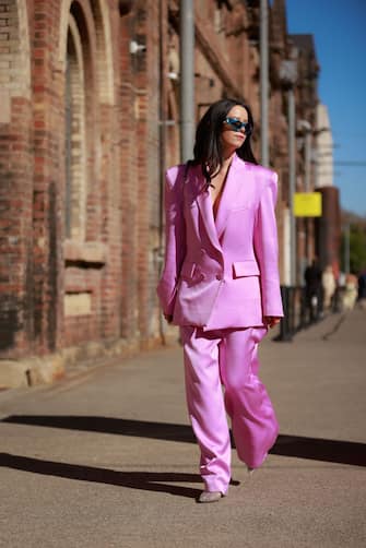 SYDNEY, AUSTRALIA - MAY 19: Alice Margot Christie wearing Alex Perry pink suit and Bulgari silver bag at Afterpay Australian Fashion Week 2023 at Carriageworks on May 19, 2023 in Sydney, Australia. (Photo by Hanna Lassen/Getty Images)