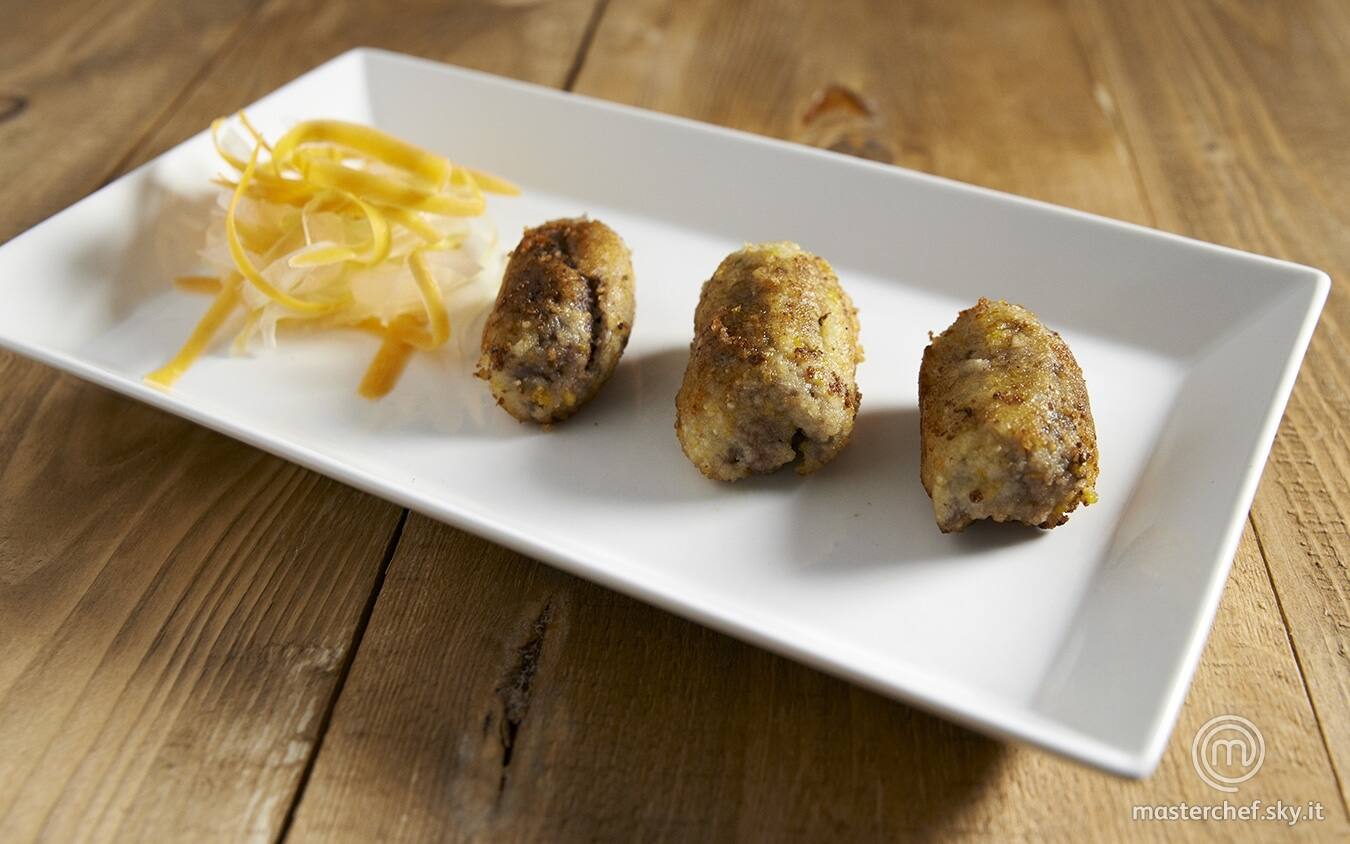 Involtini di manzo con scorza d’arancia, lardo e fichi secchi