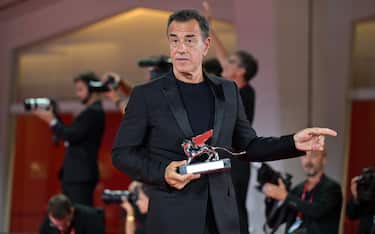 Italian director Matteo Garrone holds the Silver Lion for Best Director for Io Capitano (Me Captain) during the closing ceremony of the 80th annual Venice International Film Festival, in Venice, Italy, 09 September 2023. The 80th edition of the Venice Film Festival runs from 30 August to 09 September 2023.   ANSA/ETTORE FERRARI