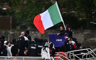 PARIS, FRANCE - JULY 26: Italy athletes aboard a boat in the floating parade on the river Seine during the Opening Ceremony of the Olympic Games Paris 2024 on July 26, 2024 in Paris, France. (Photo by Image Photo Agency/Getty Images)