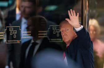 epa10557453 Former US president Donald J. Trump arrives to Trump Tower in New York, New York, USA, 03 April 2023. After being indicted by a Manhattan grand jury last week, former US President Donald J. Trump is traveling to New York 03 April and will reportedly turn himself in on 04 April at New York Criminal Court to hear the charges against him.  EPA/JUSTIN LANE