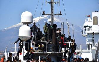 The fishing boat carrying about 600 migrants rescued in recent days 100 miles off the coast of Sicily towed by a tugboat arrived in the port of Catania, Italy, 12 April 2023. The vessel was escorted by the 'Nave Peluso' of the Coast Guard. The migrants on board greeted their arrival with applause and whistles and shouts of 'Bella Italia'.
ANSA/Orietta Scardino