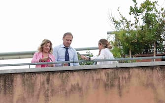 Francesco Lollobrigida e Arianna Meloni (D) su un terrazzo della Camera durante una pausa della giornata di lavoro del presidente di Fratelli d'Italia Giorgia Meloni,  Roma 7 ottobre 2022. ANSA/GIUSEPPE LAMI.