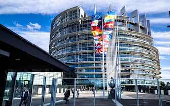 epa11482031 General outside view of the European flags in front of the Parliament in Strasbourg, France, 16 July 2024. The first session of the new European Parliament opened on 16 July, with MEPs electing their president for the next two and a half years.  EPA/CHRISTOPHE PETIT TESSON