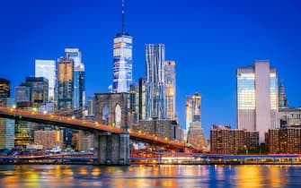 New York, United States of America. Brooklyn Bridge at dusk viewed from the Brooklyn Bridge Park in New York City, USA.